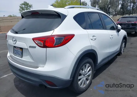 2014 Mazda Cx-5 Sport from USA, damaged, VIN JM3KE2BE1E0330808